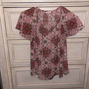 Maurices flutter sleeve peasant style blouse.